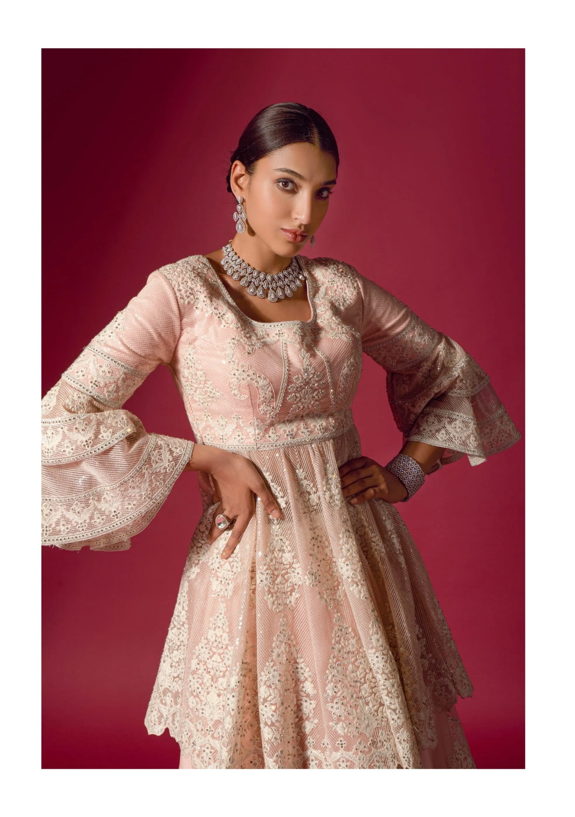 Exquisite Peach Designer Lehenga Choli with Intricate Embroidery