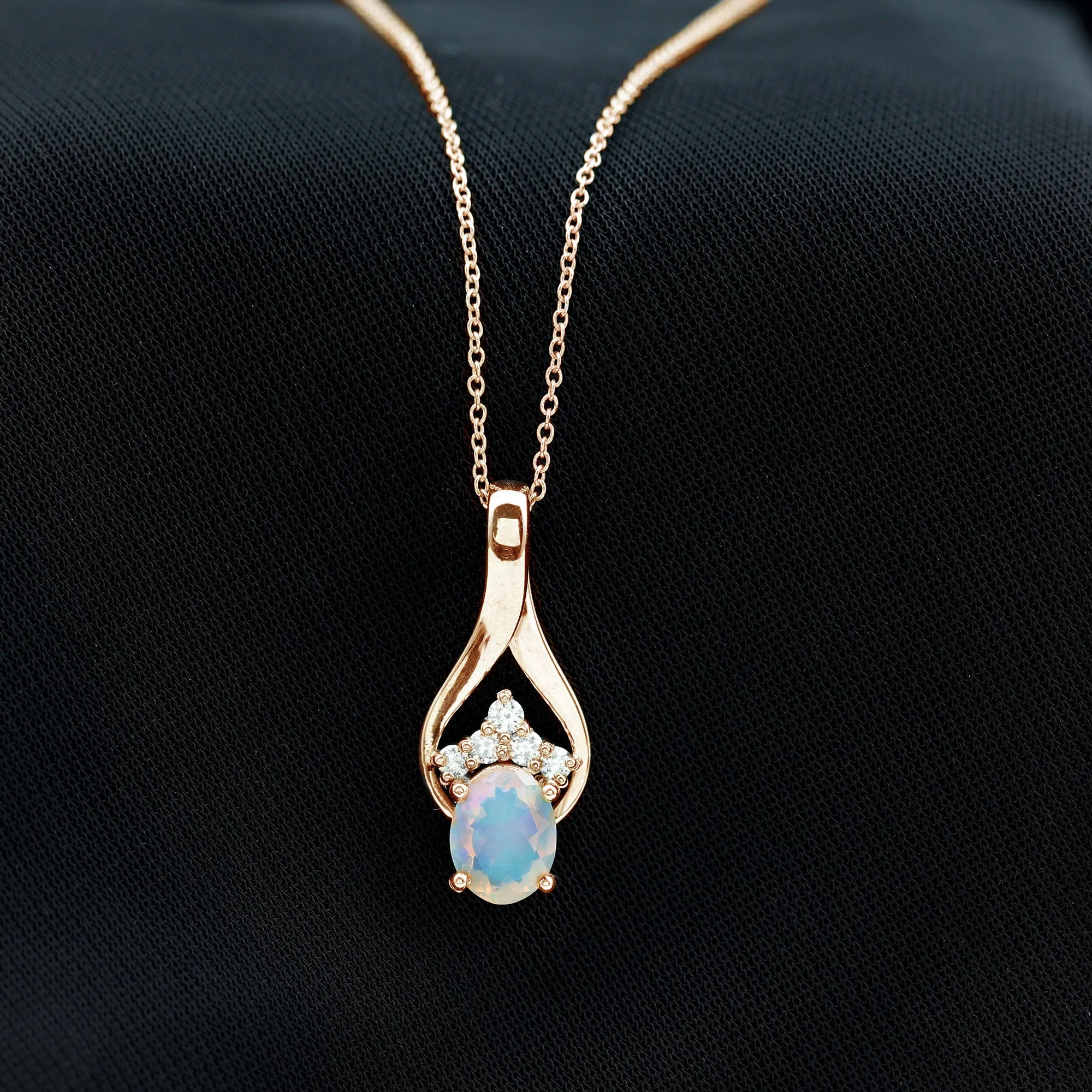 Oval Ethiopian Opal and Moissanite Teardrop Pendant