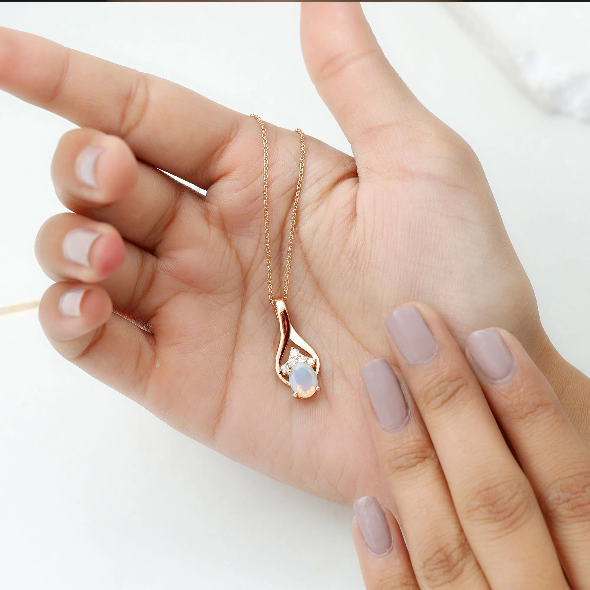 Oval Ethiopian Opal and Moissanite Teardrop Pendant