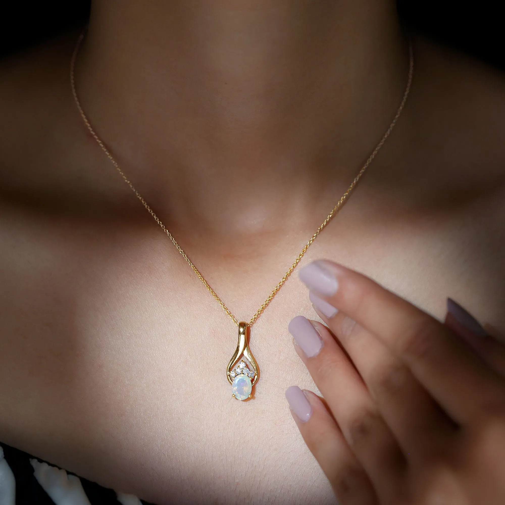 Oval Ethiopian Opal and Moissanite Teardrop Pendant
